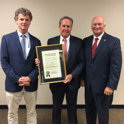 Secretary Hammond honors Evening Post Industries Inc.